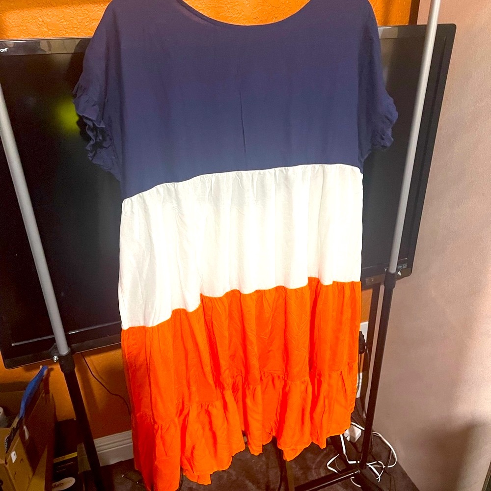 Two dresses, two rompers, and one shirt. Clothes are size 2x.